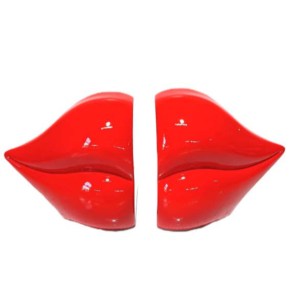 Red lip-shaped bookends on a white background