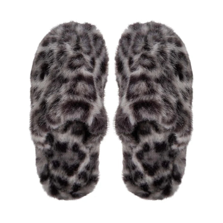 Pair of leopard print slippers on a white background